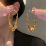 Pailletten-Ohrringe mit Quasten – Gold