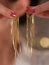 Lange Quasten-Ohrringe – Gold
