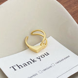 Asymmetrischer verstellbarer Ring aus Silber – Goldene