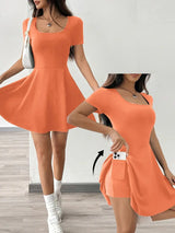 Gudrun – Schickes Skaterkleid mit integrierten Shorts und Tasche – Orange