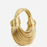 Luxuriöse goldfarbene Tasche mit skulpturalem Griff – Gold