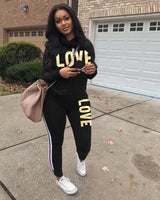 Damen nan sportives Kapuzen-Sweatshirt-Set mit Goldprint und Highwaist-Jogginghose Drune – Schwarz