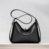 Aria | Elegante Damenhandtasche aus echtem Leder mit Drehverschluss, Top-Handle & Gold-Details – Strukturierte Schultertasche – Schwarz