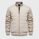 Nils | Steppjacke mit gestrickten Ärmeln für stilvolle Wärme – Beige