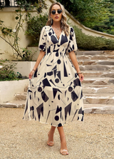 Josette - Midi Kleid Mit Blumenmuster – Beige