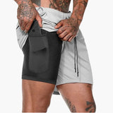 Herren Fitness Shorts mit Innentasche und Kompressionsebene – Hellgrau