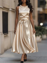 Sabine - Elegantes Midikleid mit Schleife – Gold