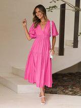 Abiah – Elegantes Midikleid mit Puffärmeln – Rosa