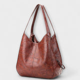 Reniva – Vintage-Schultertasche mit klarer Linie – Weinrot