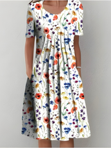 Amelia - Plissiertes Softtouch-Kleid – Weiß (Rote Blumen)