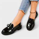 Camille – Lack-Loafer mit Schleifendetail und Profilsohle – Schwarz