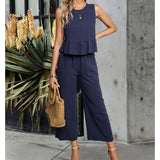 Celeste - Ärmelloser Jumpsuit mit weitem Bein und Rüschen – Dunkelblau