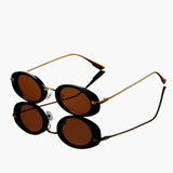 Damen Sonnenbrille mit runden Gläsern und UV-Schutz – Schwarzgold