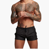 Herren Badeshorts mit Kordelzug und Seitentaschen mit Reißverschluss – Schwarz