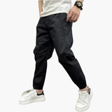 Herren Sommerhose mit Knopfleiste und elastischen Bündchen – Schwarz
