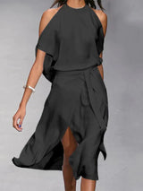 Madonna - Elegantes Kleid mit modischen Schulterausschnitten. – Schwarz