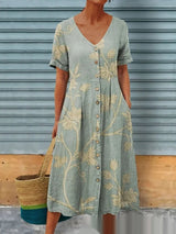Luna - Midikleid mit Blumenmuster und Knopfverschluss vorne – Hellblau