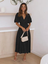 Abiah – Elegantes Midikleid mit Puffärmeln – Schwarz