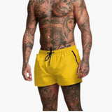 Herren Badeshorts mit Kordelzug und Seitentaschen mit Reißverschluss – Hellgelb