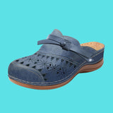 Aerina - Flache, gepolsterte Mules – Blau