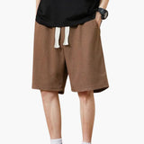 Herren Shorts knie­lang mit Seitentaschen für den Sommer – Braun