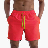 Herren Badeshorts mit Kordelzug und Seitentaschen – Korallenrot