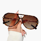 Damen Sonnenbrille mit UV400 Schutz und zweifarbigem Rahmen – Leopardbraun