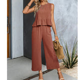Celeste - Ärmelloser Jumpsuit mit weitem Bein und Rüschen – Braun