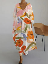 ISLA | KLEID MIT V-AUSSCHNITT UND BLUMENDRUCK – Orange