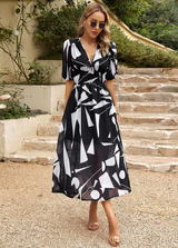 Josette - Midi Kleid Mit Blumenmuster – Schwarz