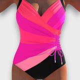 Nerine – Schwarzer Badeanzug mit raffiniertem Twist – Rosa