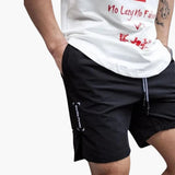Herren Badeshorts mit Seitentaschen und elastischem Bund – Schwarz