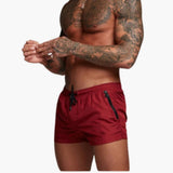 Herren Badeshorts mit Kordelzug und Seitentaschen mit Reißverschluss – Weinrot