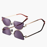 Damen Sonnenbrille mit halbrandlosen ovalen Gläsern – Lilarosa
