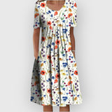 Lucy | Kleid mit Blumenstickerei – Blumenrot