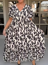 Colette | Flüssiges Kleid mit V-Ausschnitt – Schwarz