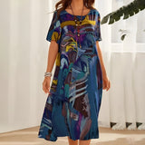 Joelle | Fließendes und elegantes Blumenkleid – Blau