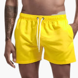 Schnelltrocknende Badehose - für Herren mit sportlichem Look – Gelb