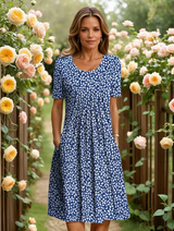 MARGA | ELEGANTES KLEID MIT BAUCHABDECKUNG – Blau Floral