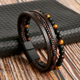 Here’s the translation into German:  Leder Herren-Armbandset - Armand – Braun
