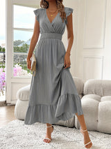 Nicole | Elegantes Kleid mit V-Ausschnitt – Grau