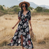 Lucia - Maxikleid mit V-Ausschnitt und Blumenmuster – Schwarz