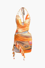 Mira | Asymmetrischer Seitenschlitz Neckholder-Minikleid mit Kunstdruck – Orange