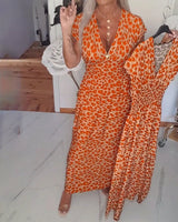 Erendira – Elegantes Kleid Mit V-Ausschnitt Und Leopardenmuster – Orange