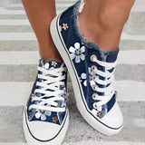 Daisy - Blumenbedruckte Denim-Sneakers – Dunkelblau