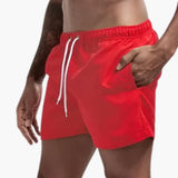 Schnelltrocknende Badehose - für Herren mit sportlichem Look – Rot