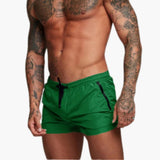 Herren Badeshorts mit Kordelzug und Seitentaschen mit Reißverschluss – Grün
