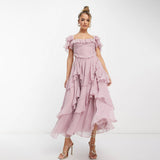 Ofelia | Plissee-Kleid mit Rüschen und Lotusblatt-Details für den Urlaub – Rosa