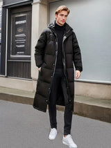 Lange Wattierte Steppjacke mit Kapuze – Schwarz