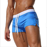 Schnelltrocknende Badeshorts Herren kurz mit Kordelzug – Hellblau